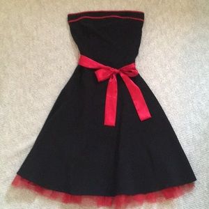 Black strapless dress with red accents